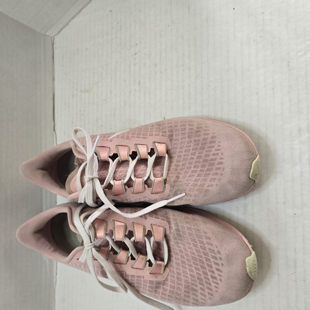 Nike Pink and White Athletic Shoes with Textured Knit Design - Picture 1 of 8